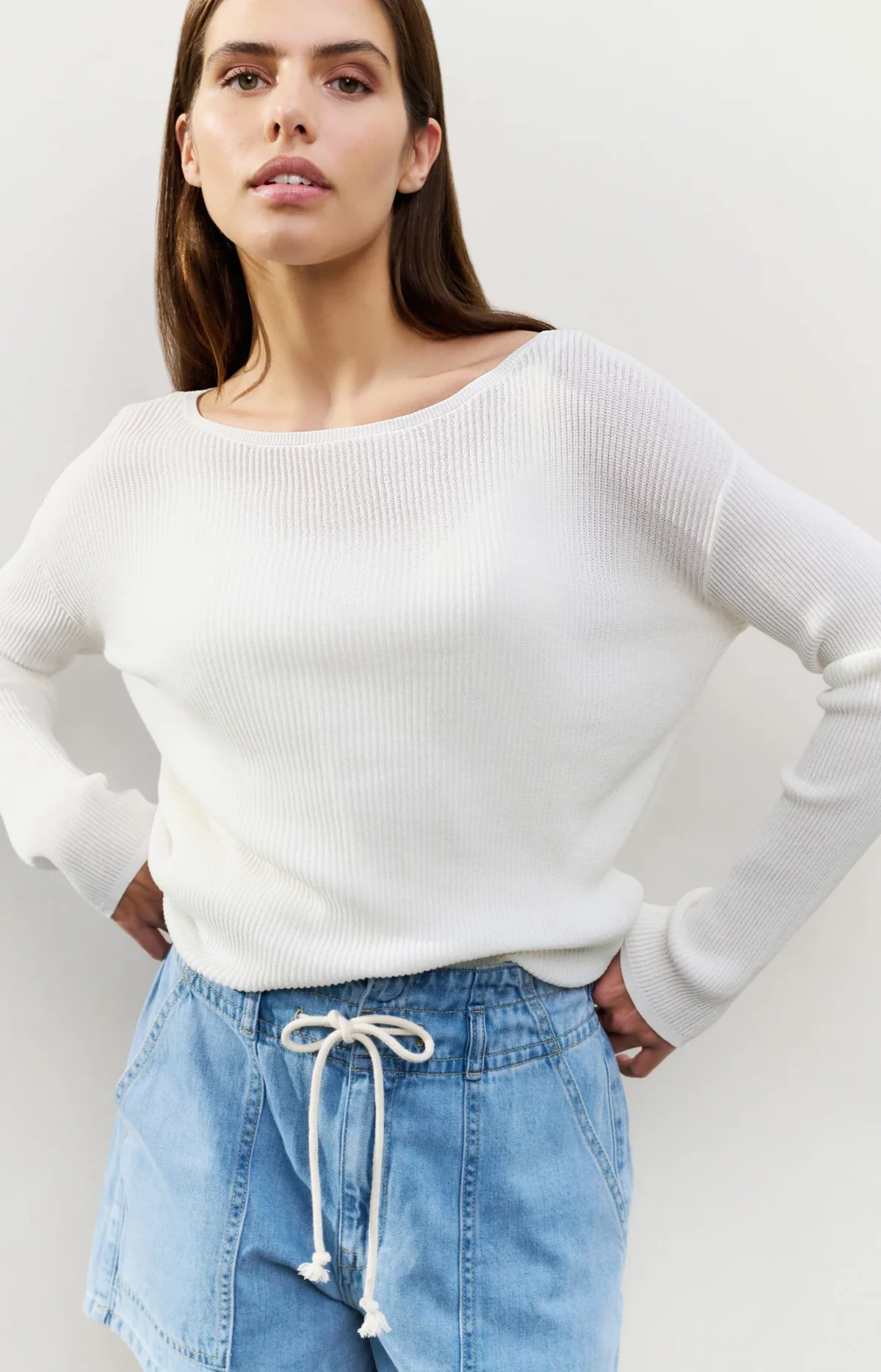 Pull en maille avec bouton au dos