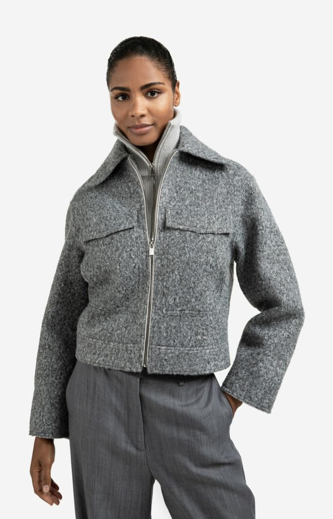 Veste courte en maille bouclette